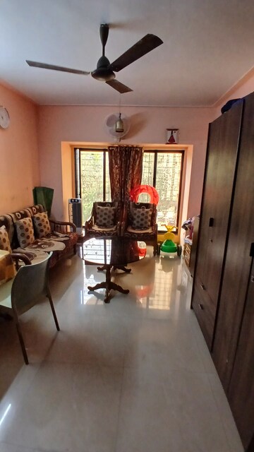 Living Room in 2 BHK Apartment at Lokhandwala Whispering Palms, Kandivali East – for Sale