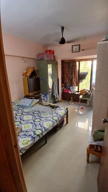 Bedroom in 2 BHK Apartment at Lokhandwala Whispering Palms, Kandivali East – for Sale