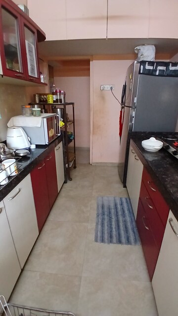 Kitchen in 2 BHK Apartment at Lokhandwala Whispering Palms, Kandivali East – for Sale