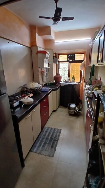 Kitchen in 2 BHK Apartment at Lokhandwala Whispering Palms, Kandivali East – for Sale