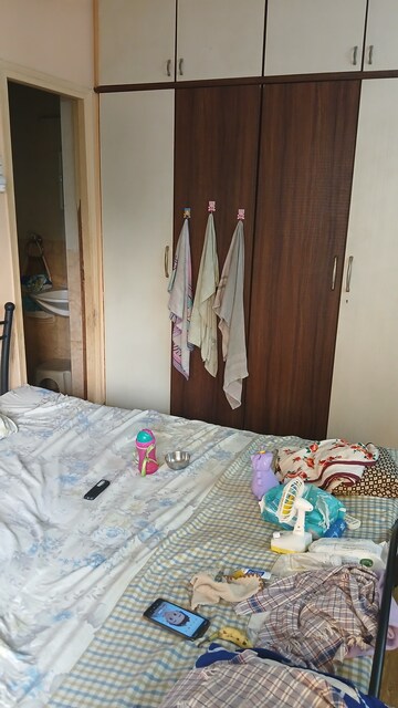 Bedroom in 2 BHK Apartment at Lokhandwala Whispering Palms, Kandivali East – for Sale