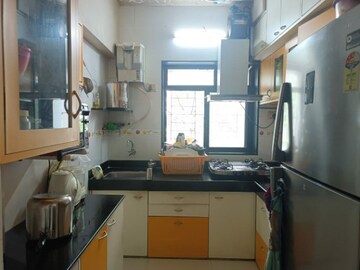 Kitchen in 2 BHK Apartment at Spring Leaf 6 CHS, Kandivali East – for Sale