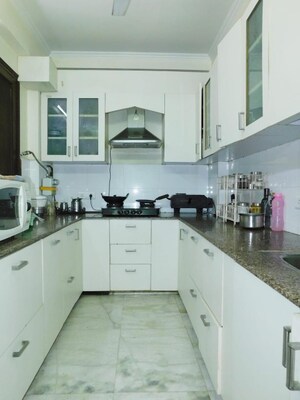 Kitchen in 3 BHK Builder Floor at South Extension I – for Sale