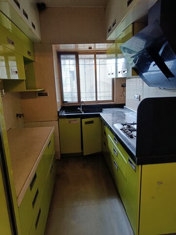 Kitchen in 2 BHK Apartment at Montreal Tower, Andheri West – for Rent