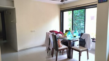 Living Room in 2 BHK Apartment at Hiranandani Powai Park, Powai – for Rent
