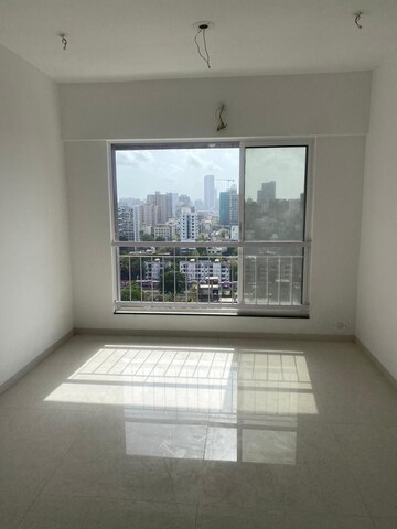 Room in 2 BHK Apartment at Mahindra Roots, Kandivali East – for Sale