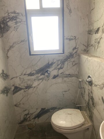 Bathroom in 2 BHK Apartment at Mahindra Roots, Kandivali East – for Sale