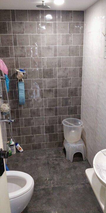 Bathroom in 2 BHK Apartment at Oshiwara – for Rent