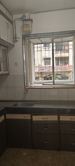 Kitchen in 2 BHK Apartment at Gundecha Orchid Tower, Kandivali East – for Sale