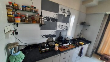 Kitchen in 2.5 BHK Apartment at Runwal Garden City, Balkum Pada – for Rent