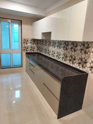 Kitchen in 2 BHK Apartment at Relliance Lashkaria Solitaire, Andheri West – for Sale
