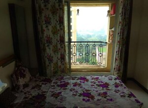 Room in 2 BHK Apartment at Vijay Galaxy, Waghbil – for Sale