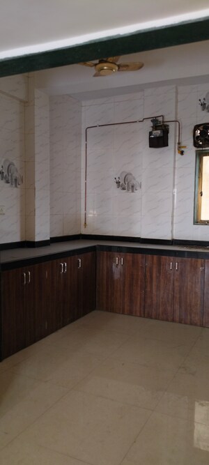 Kitchen in 1 BHK Apartment at Sagar Kinara, Seawoods – for Sale