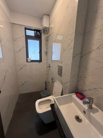 Bathroom in 2 BHK Apartment at Dev Leo Tower, Oshiwara – for Rent
