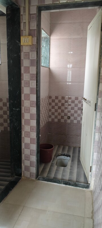 Bathroom in 1 RK Apartment at Seawoods Sector 48 – for Rent