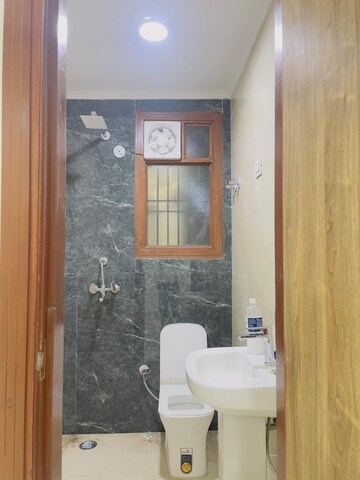 Bathroom in 2 BHK Apartment at Palm Residency Chhatarpur, Chattarpur – for Rent