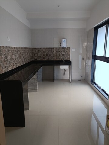 Kitchen in 3 BHK Apartment at Rajesh Raj Infinia, Malad West – for Rent
