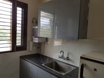 Kitchen in 3 BHK Apartment at DLF Exclusive Floors, Sector 53 – for Sale