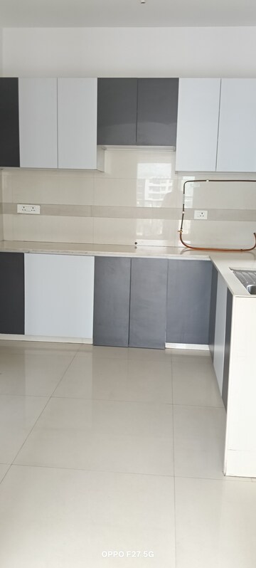 Kitchen in 3 BHK Apartment at Soham Crystal Spires, Ghodbunder Road – for Rent