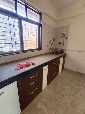 Kitchen in 2 BHK Apartment at Ganesh Niwas CHS, Charai – for Rent