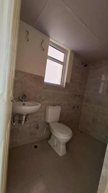 Bathroom in 2 BHK Apartment at Wave Dream Homes, Wave City – for Rent