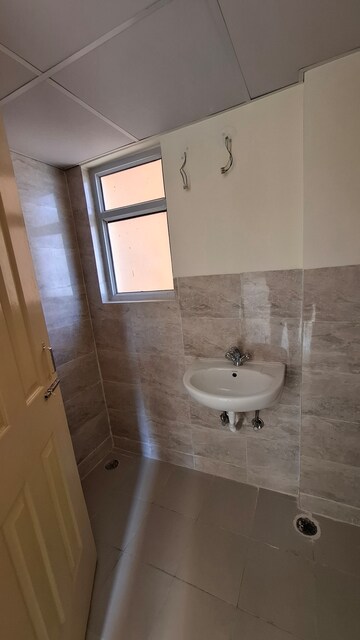 Bathroom in 2 BHK Apartment at Wave Dream Homes, Wave City – for Rent