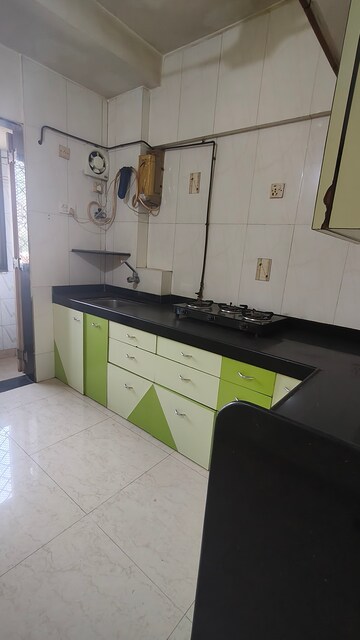 Kitchen in 2 BHK Apartment at Satellite Garden, Goregaon East – for Rent