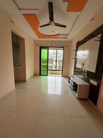 Living Room in 1 BHK Apartment at Pranjee Garden City Phase 2, Katrap – for Rent