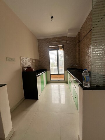 Kitchen in 1 BHK Apartment at Pranjee Garden City Phase 2, Katrap – for Rent