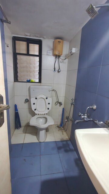 Bathroom in 2 BHK Apartment at Satellite Garden, Goregaon East – for Rent