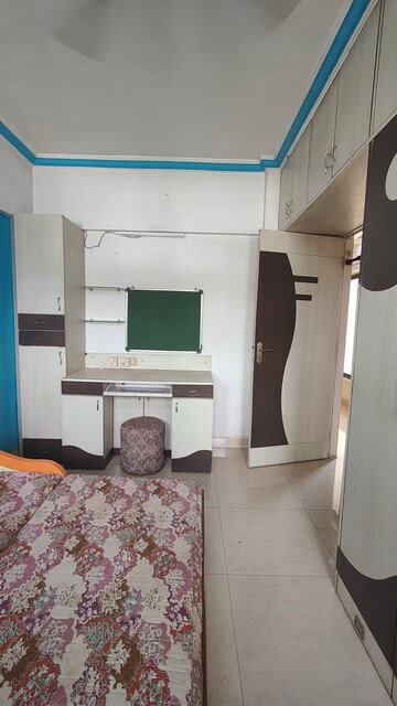 Bedroom in 2 BHK Apartment at Satellite Garden, Goregaon East – for Rent