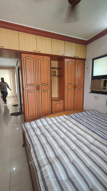 Bedroom in 2 BHK Apartment at Satellite Garden, Goregaon East – for Rent