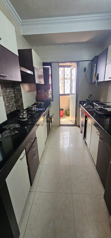 Kitchen in 3 BHK Apartment at Yogi Residency, Borivali East – for Rent