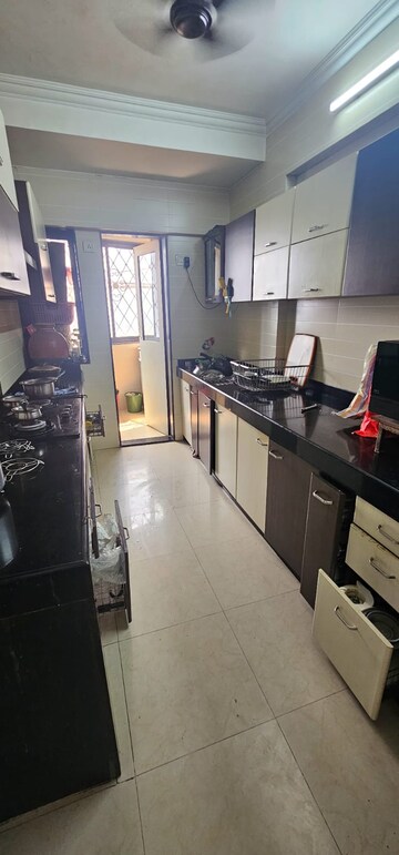 Kitchen in 3 BHK Apartment at Yogi Residency, Borivali East – for Rent