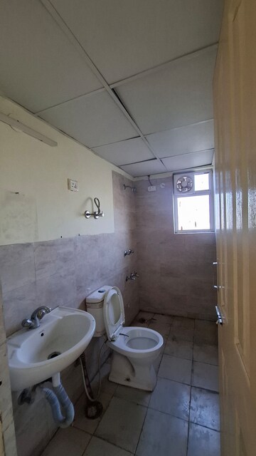 Bathroom in 2.5 BHK Apartment at Wave Dream Homes, Wave City – for Rent
