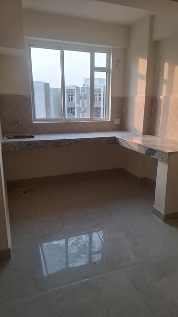 Kitchen in 1 RK Apartment at Wave Dream Homes, Wave City – for Rent