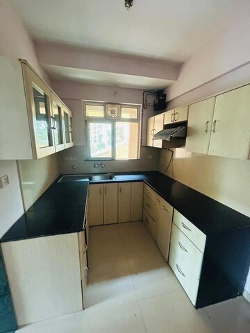 Kitchen in 2 BHK Apartment at Hiranandani Meadows, Manpada – for Rent