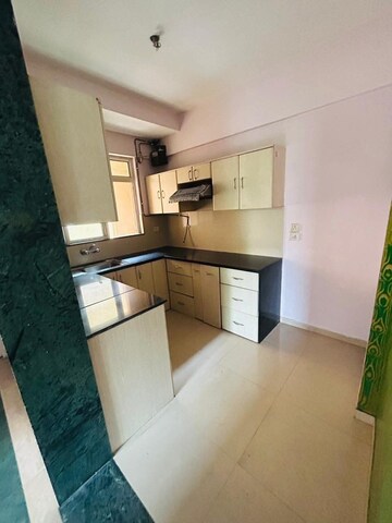 Kitchen in 2 BHK Apartment at Hiranandani Meadows, Manpada – for Rent