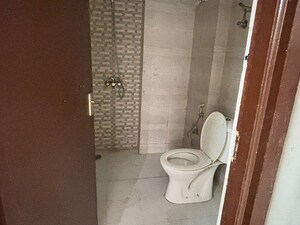 Bathroom in 2 BHK Apartment at Galaxy Royale, Gaur City 2 – for Sale