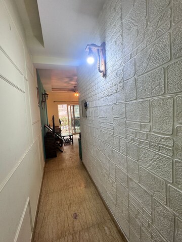 Bathroom in 2 BHK Apartment at Mahagun Moderne, Sector 78 – for Sale