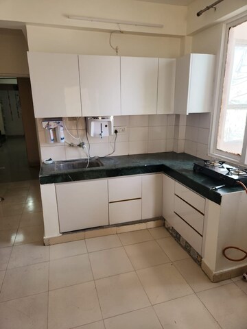 Kitchen in 3 BHK Apartment at Puri Pranayam, Sector 82 – for Sale