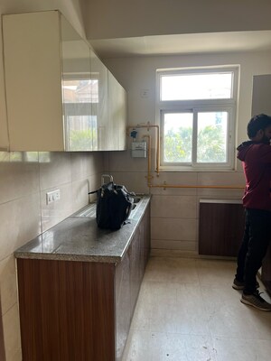 Kitchen in 4 BHK Apartment at Puri Anand Villas Phase II, Sector 81 – for Sale