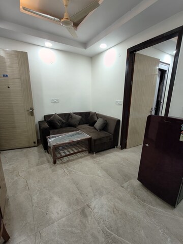 Living Room in 1 BHK Builder Floor at Ansal Sushant Apartments, Sushant Lok I – for Rent
