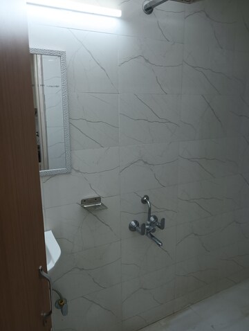 Bathroom in 1 RK Apartment at Emaar Emerald Floors Premier, Sector 65 – for Rent