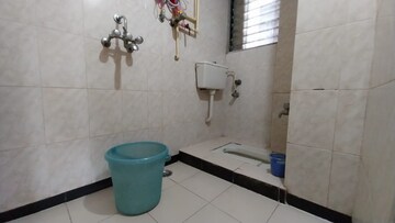 Bathroom in 1 BHK Apartment at AMI Jharna, Goregaon East – for Rent
