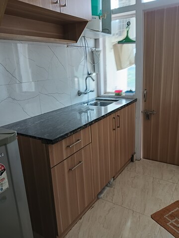 Kitchen in 1 RK Apartment at Emaar Emerald Floors Premier, Sector 65 – for Rent