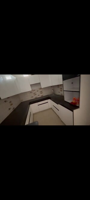 Kitchen in 2.5 BHK Apartment at Charms Castle, Raj Nagar Extension – for Sale