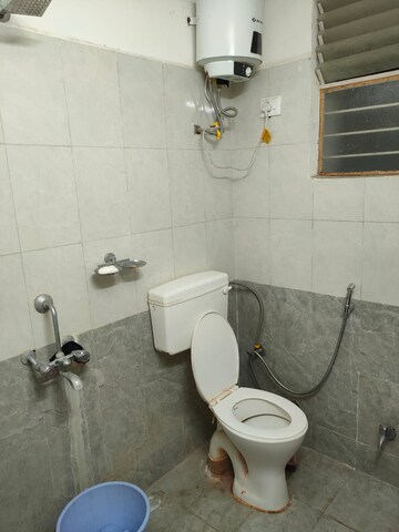 Bathroom in 3 BHK Apartment at Shiva Whispering Woods, Salaiya – for Sale