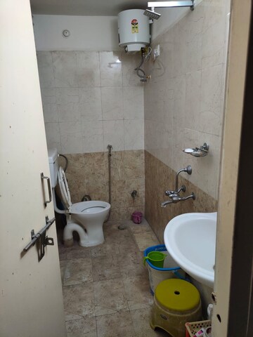 Bathroom in 3 BHK Apartment at Shiva Whispering Woods, Salaiya – for Sale