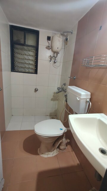 Bathroom in 2 BHK Apartment at Satellite Garden, Goregaon East – for Rent